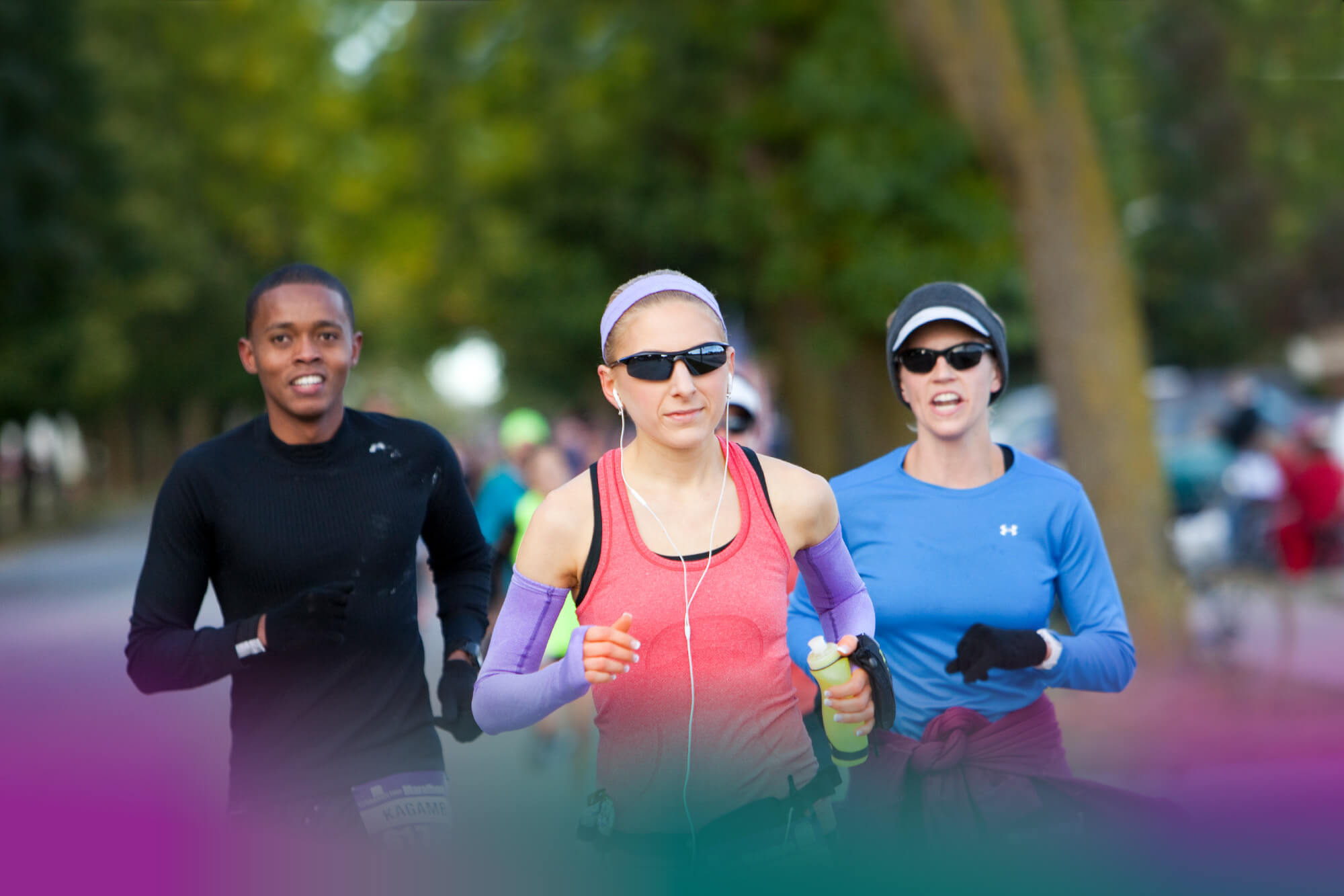 Fox Cities Marathon Group of Three People Running the Fox Cities Marathon