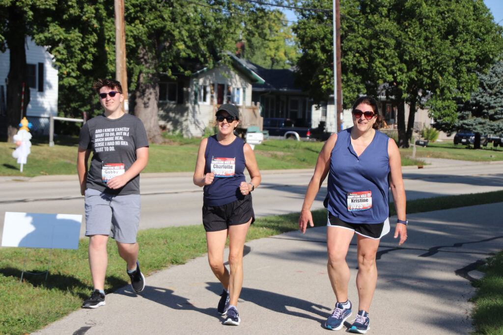 Group run walking at the Fox Cities Marathon
