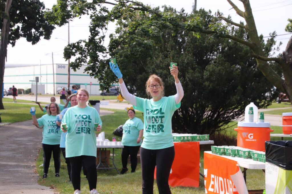 Fox Cities Marathon Gatorade Endurance water station and volunteers.