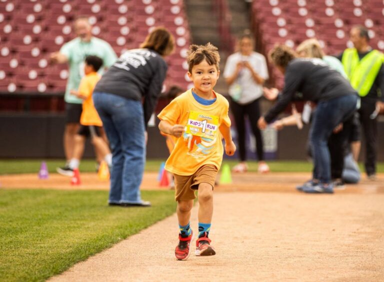 Fox Cities Marathon Kids Fun Run child running.