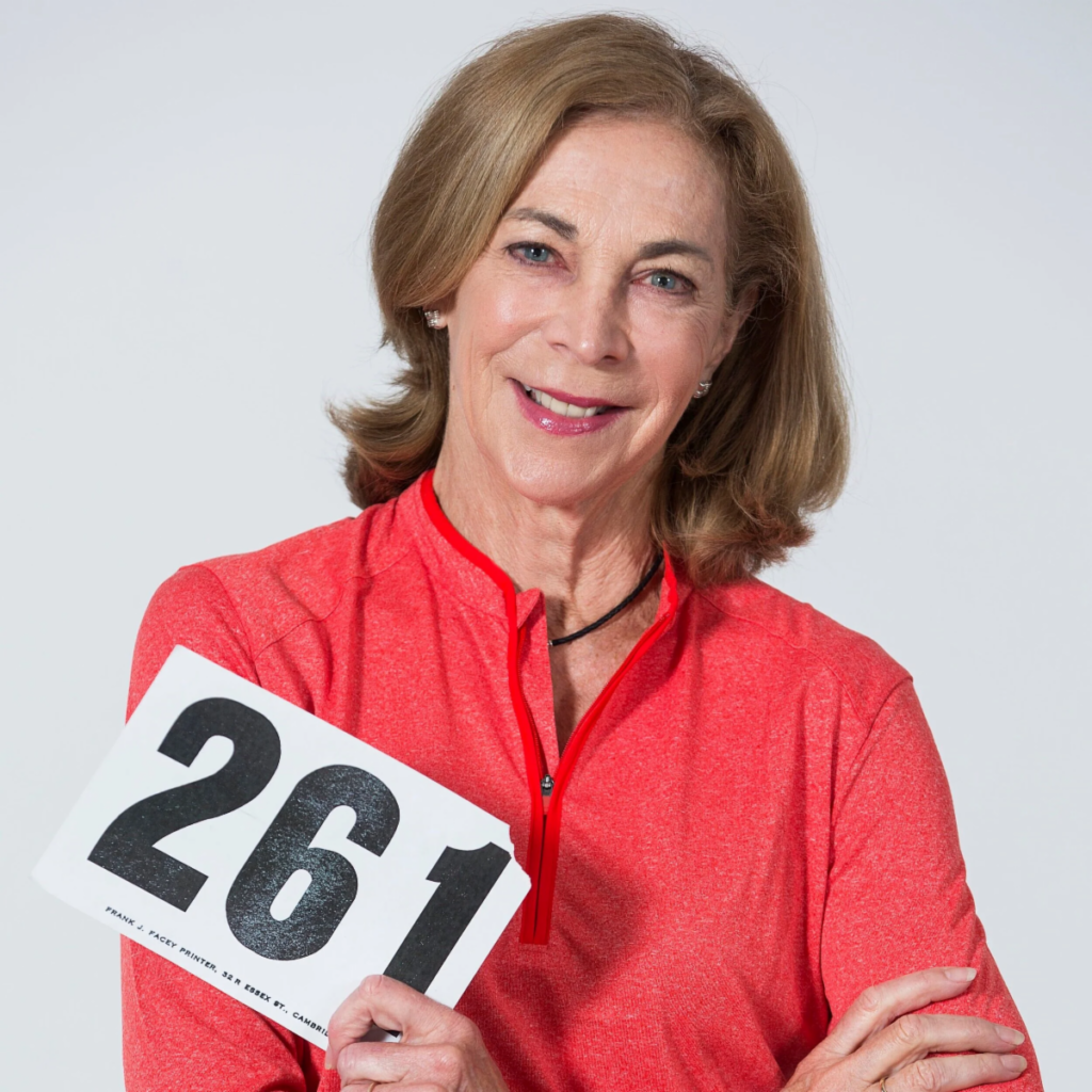 Fox Cities Marathon runner Kathrine Switzer holding bib 261.
