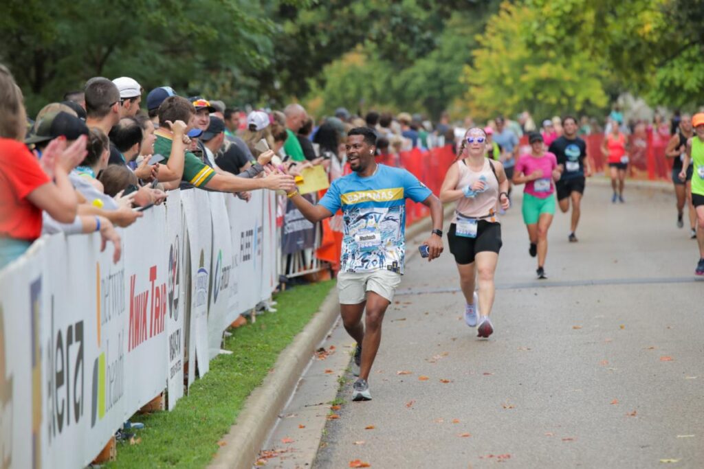 Fox Cities Marathon 5K runners with spectators.